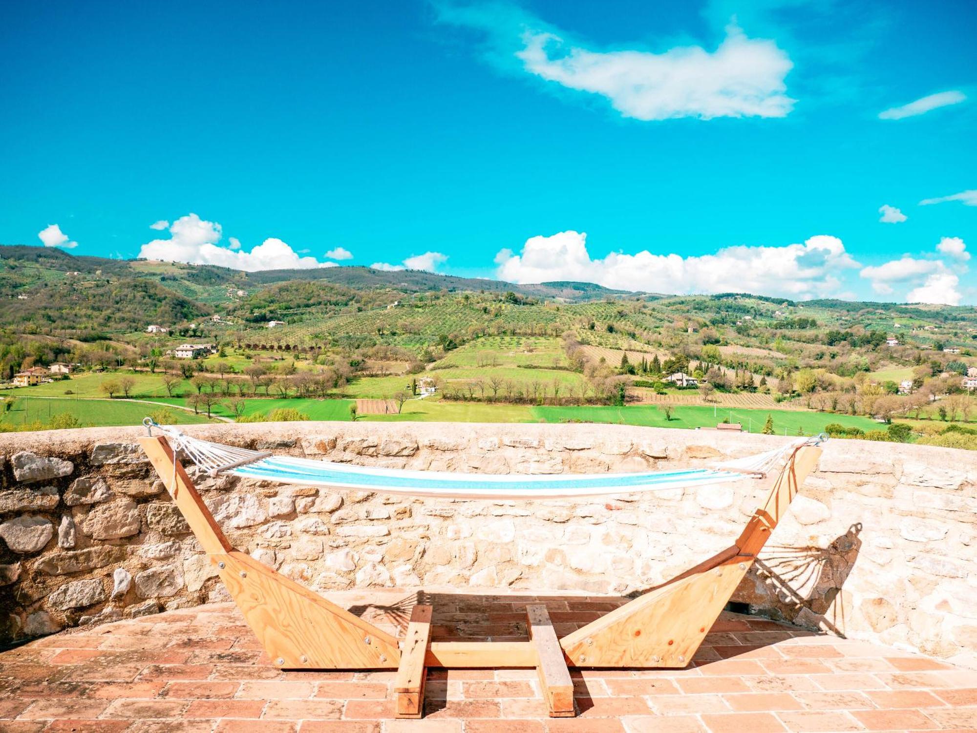 Ostello Bello Assisi Беванья Экстерьер фото